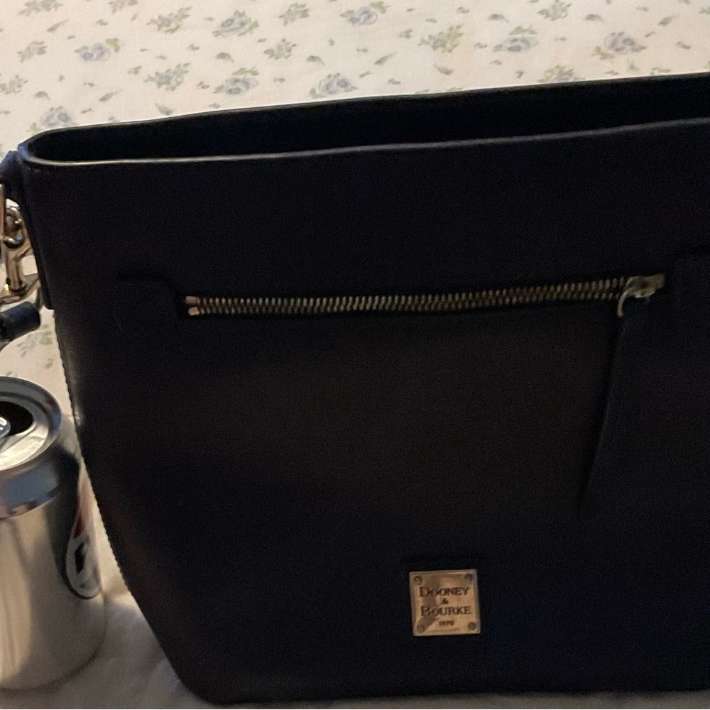 Deep Blue Dooney & Bourke crossbody purse.
